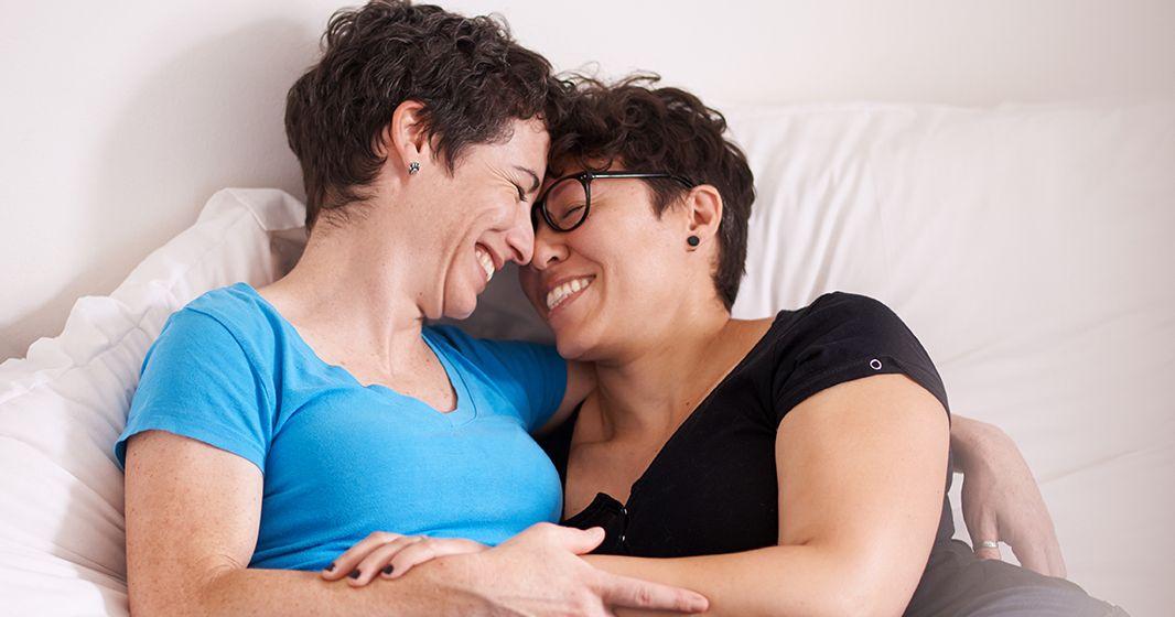 a couple hugging while discussing the connection between menopause and sex drive, including decreased orgasmic function, mood changes, and other menopause symptoms leading to lower interest in sex