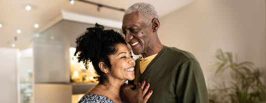 Couple sharing an intimate moment as they discuss managing painful sex in menopause