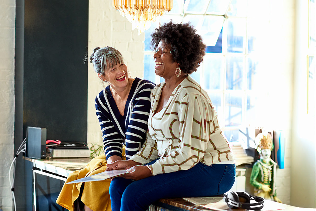 Two women going through menopause spend time together to build community