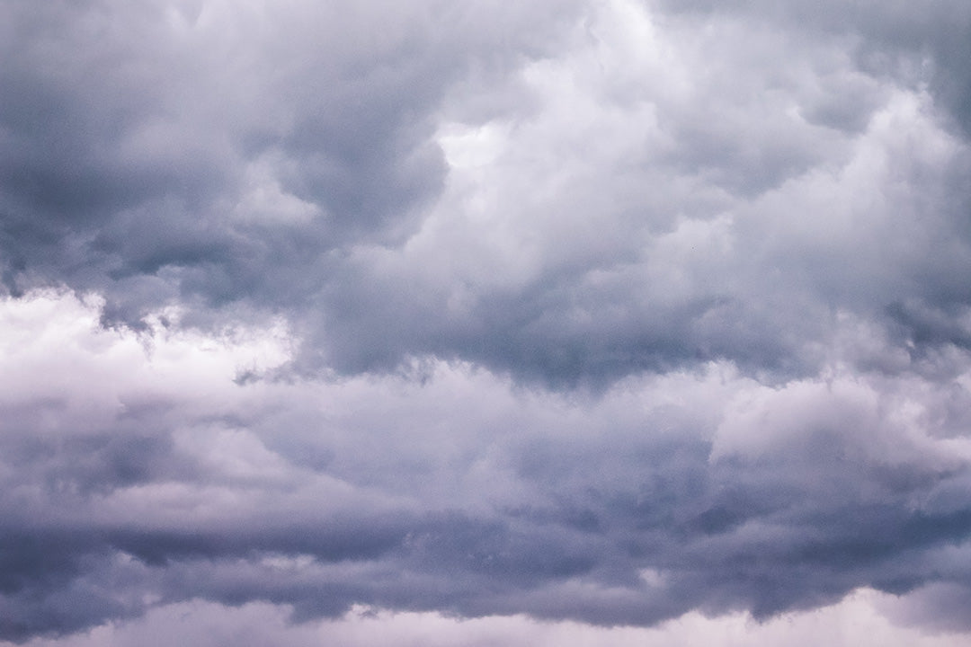 a sky full of clouds that symbolizes the feelings of sadness a woman can have during menopause