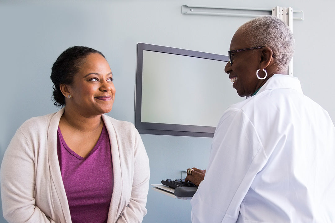 woman with menopause discussing treatment plan of non-hormonal options with her healthcare provider