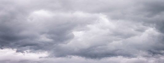 a sky full of clouds that symbolizes the feelings of sadness a woman can have during menopause