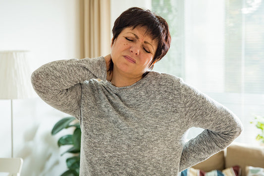 lower estrogen levels in the body during menopause leads to woman feeling muscle stiffness in her neck