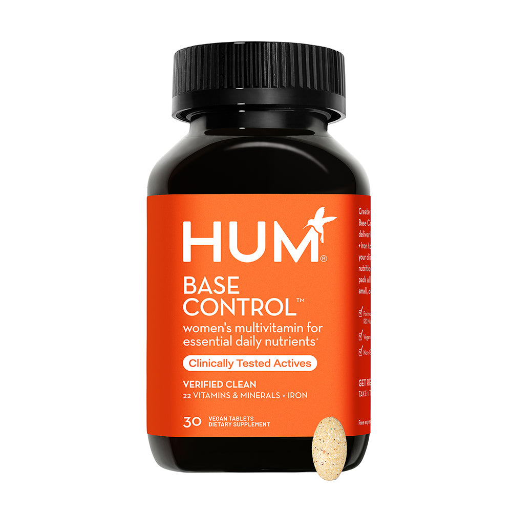 a bottle of HUM NUTRITION Base Control vegan tablets, a women's multivitamin for essential daily nutrients