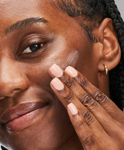 person putting NEOSTRATA Skin Active Firming Potent Retinol Complex on their face